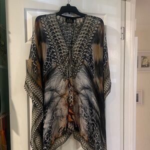 Asa Kaftan (short) asymmetrical- it’s a bathing suit cover up/top
